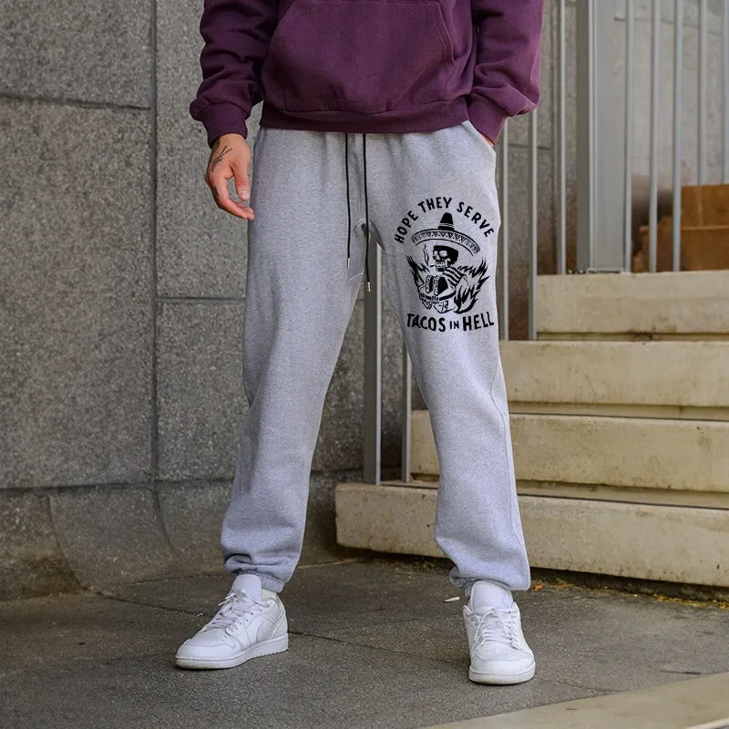 HOPE THEY SERVE TACOS IN HELL SMOKING SKULL GRAPHIC PRINT JOGGERS