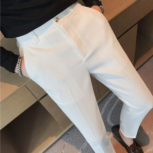Slim-fit trousers with a subtle checked pattern
